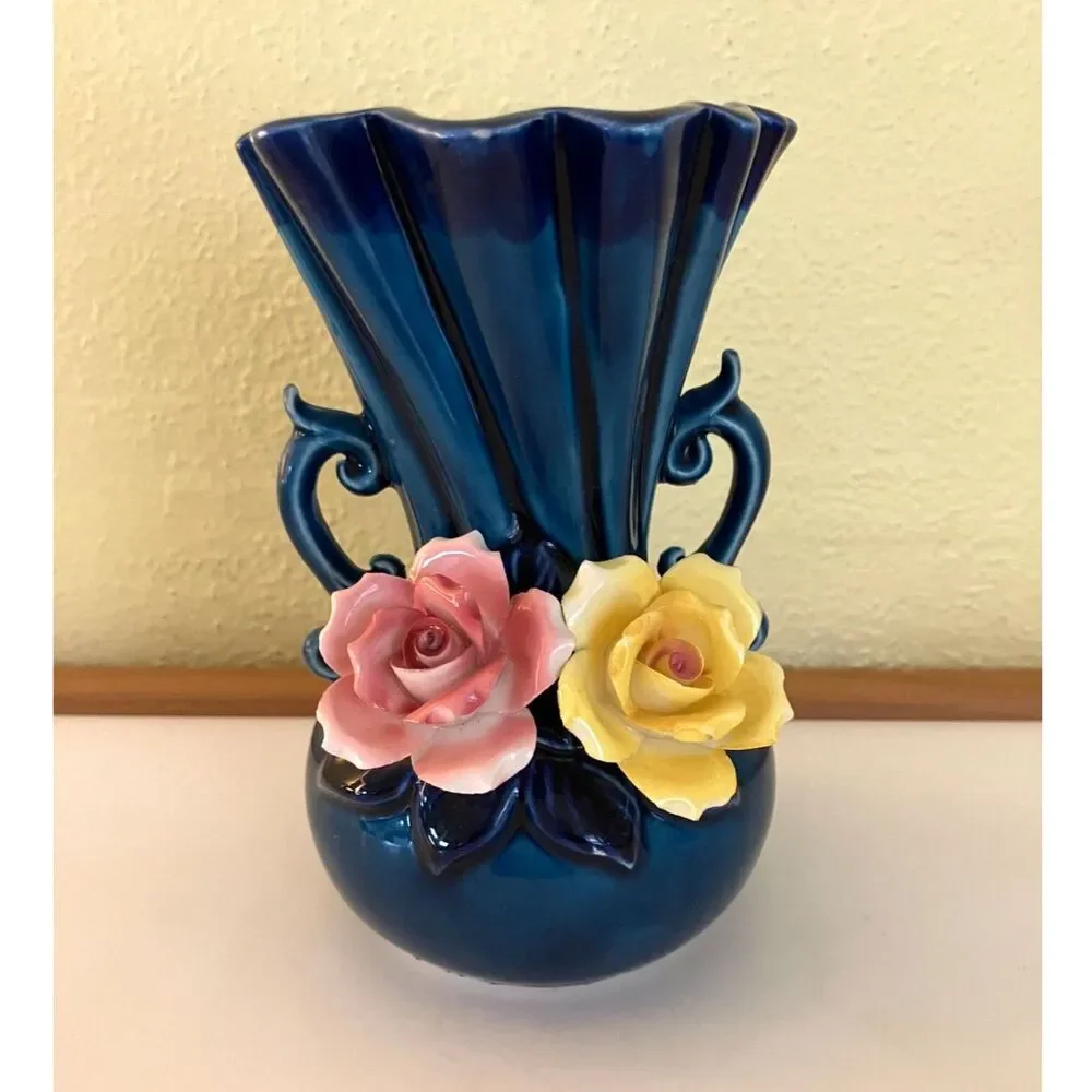 Vintage blue Brinn's Pittsburgh vase with applied roses
